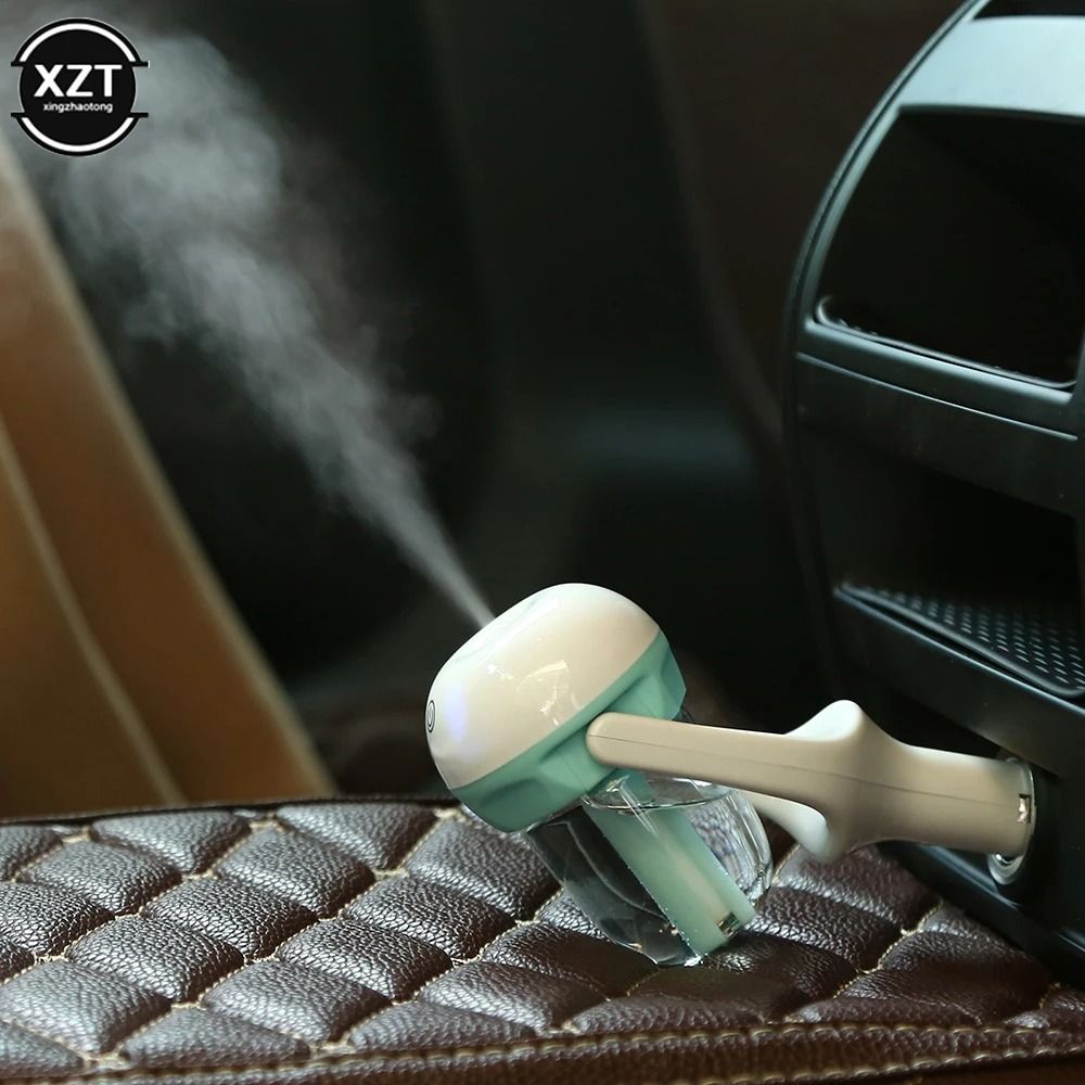 Mini Car Air Humidifier And Aroma Diffuser Portable Essential Oil Purifier 1