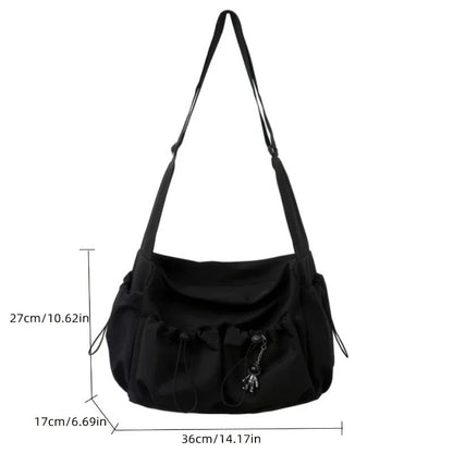 Fashionable Crossbody Bag With Drawstring Accent Spacious Secure Zipper Closure With Stylish Charm 2