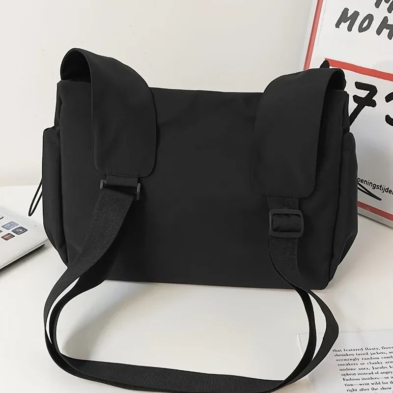 Fashionable Crossbody Bag With Drawstring Accent Spacious Secure Zipper Closure With Stylish Charm 3
