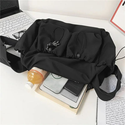Fashionable Crossbody Bag With Drawstring Accent Spacious Secure Zipper Closure With Stylish Charm 4