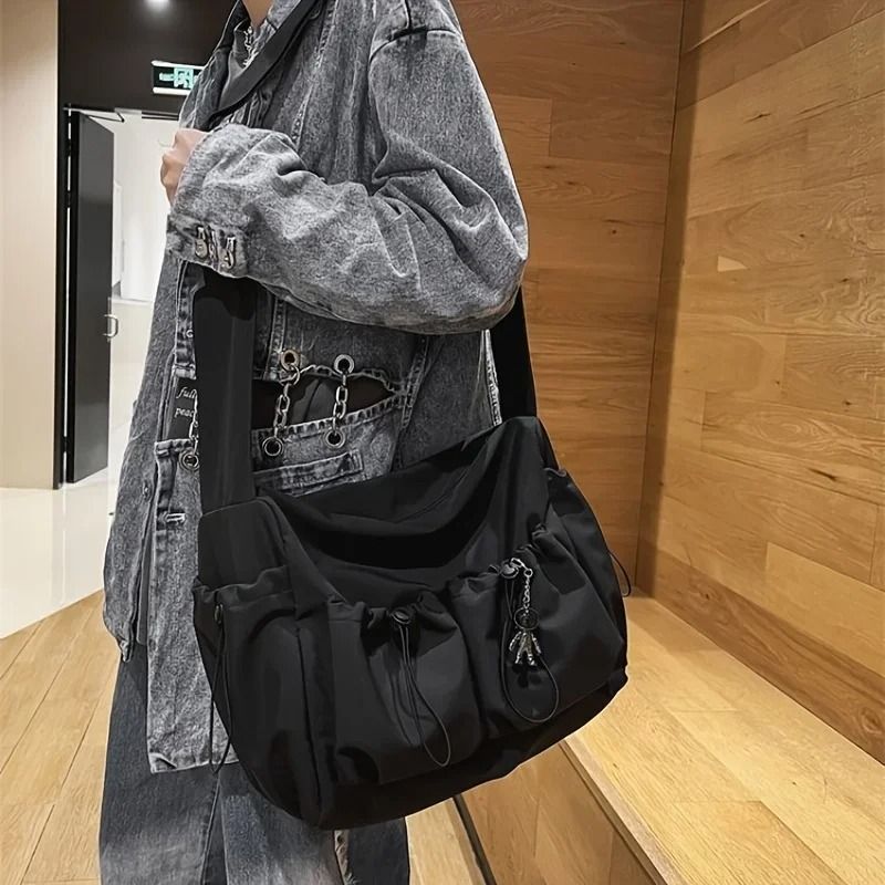 Fashionable Crossbody Bag With Drawstring Accent Spacious Secure Zipper Closure With Stylish Charm 5