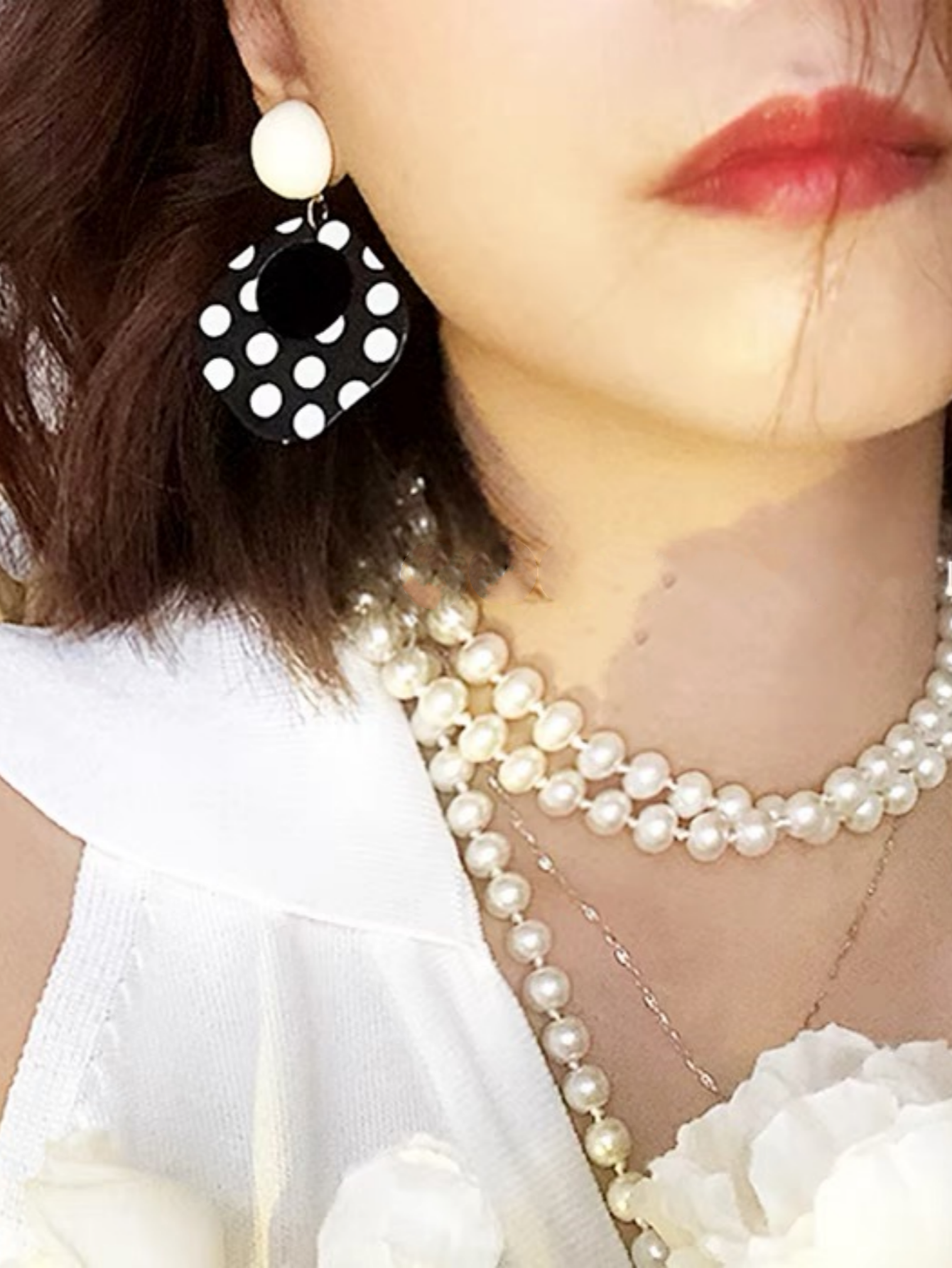 A Pair of Black and White large Polka Dot Hollow Geometric Shape Nostalgia Harbor Wind Earrings
