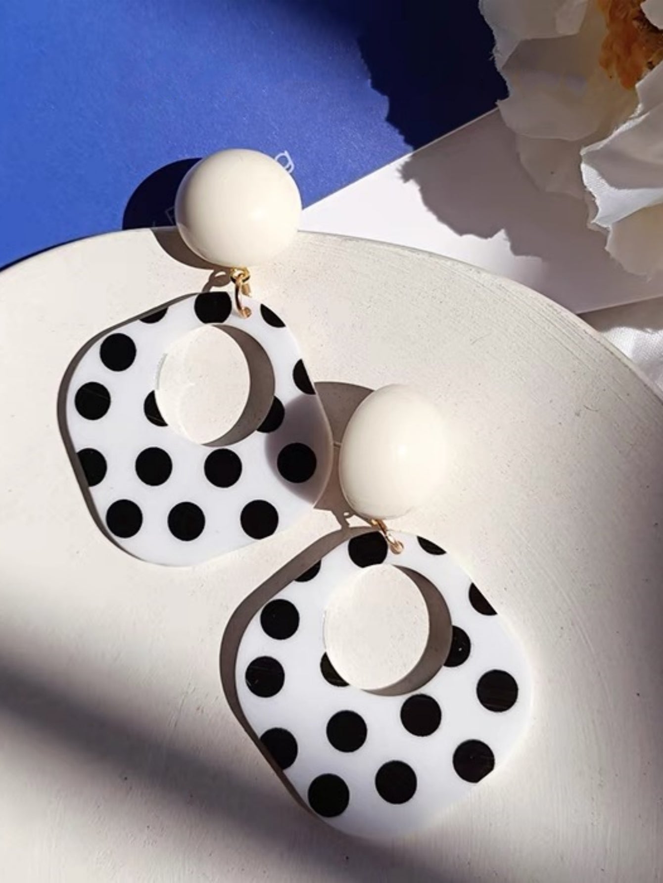 A Pair of Black and White large Polka Dot Hollow Geometric Shape Nostalgia Harbor Wind Earrings