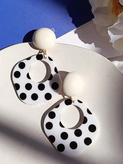 A Pair of Black and White large Polka Dot Hollow Geometric Shape Nostalgia Harbor Wind Earrings