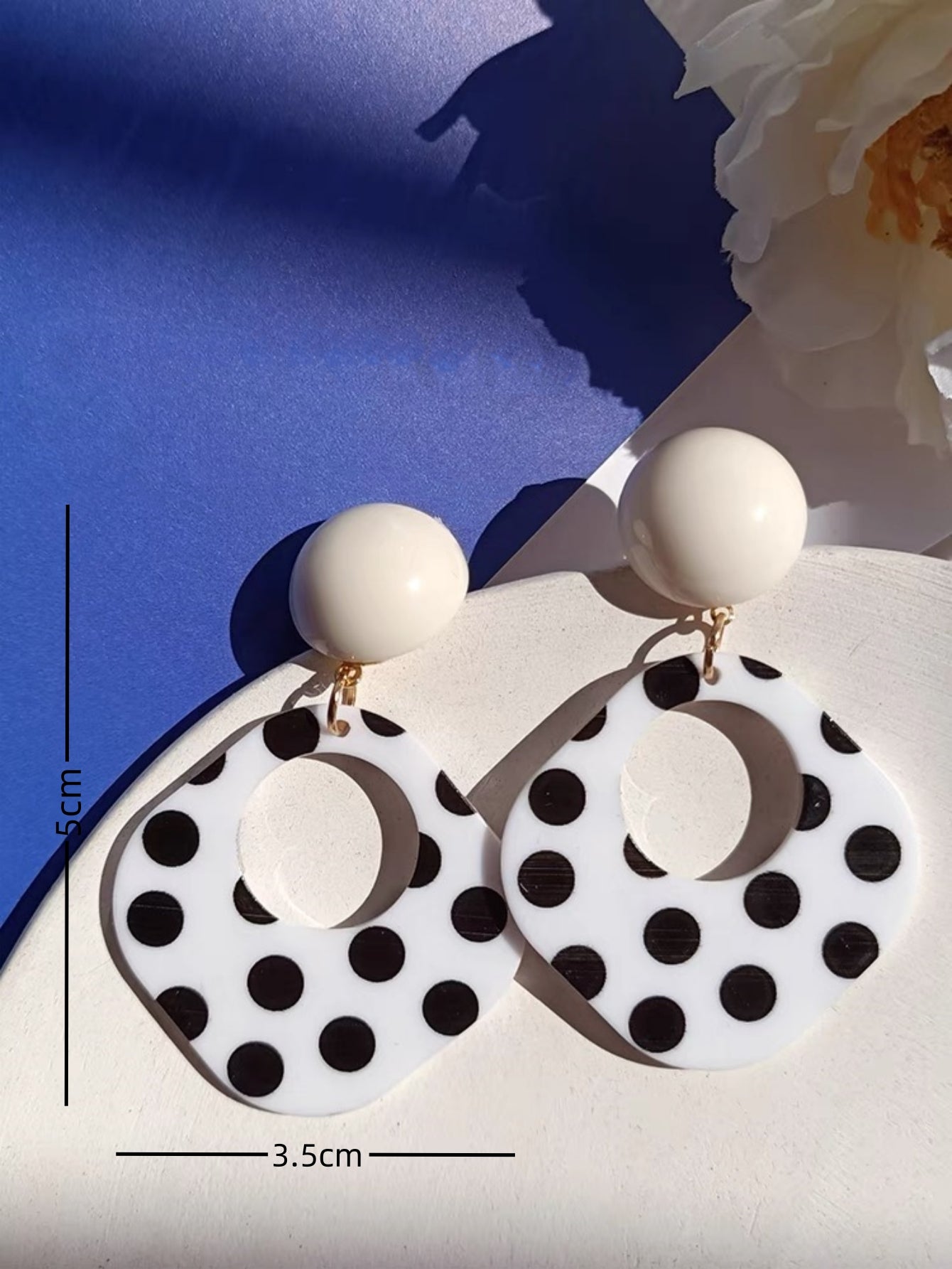 A Pair of Black and White large Polka Dot Hollow Geometric Shape Nostalgia Harbor Wind Earrings