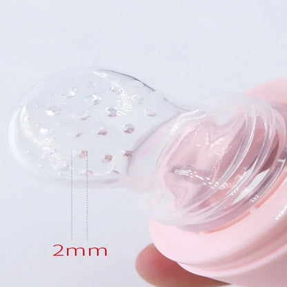 Newborn Baby Training Rice Squeezing Feeding Bottle Silicone Safe Useful Tableware Cereal Food Spoo 2