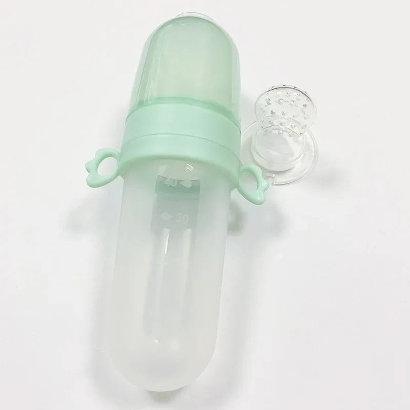 Newborn Baby Training Rice Squeezing Feeding Bottle Silicone Safe Useful Tableware Cereal Food Spoo 4