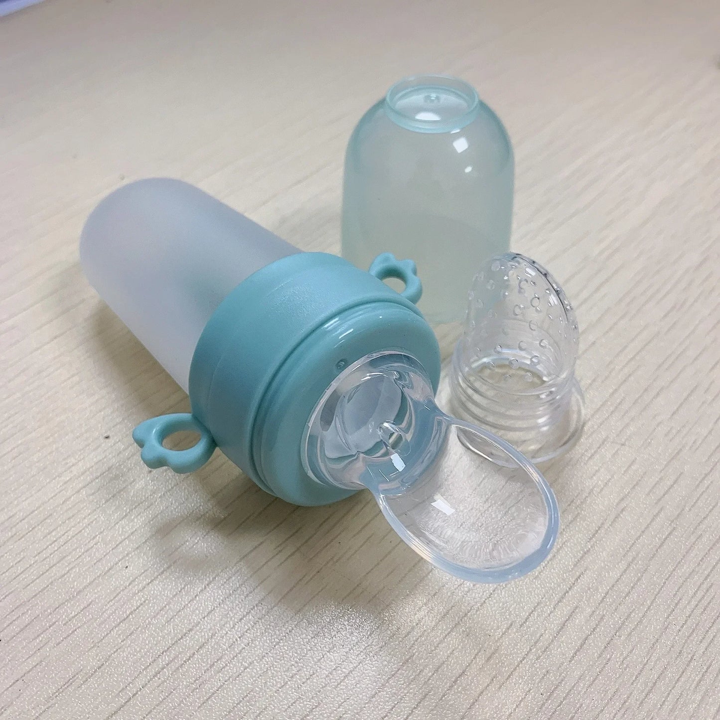 Newborn Baby Training Rice Squeezing Feeding Bottle Silicone Safe Useful Tableware Cereal Food Spoo 5