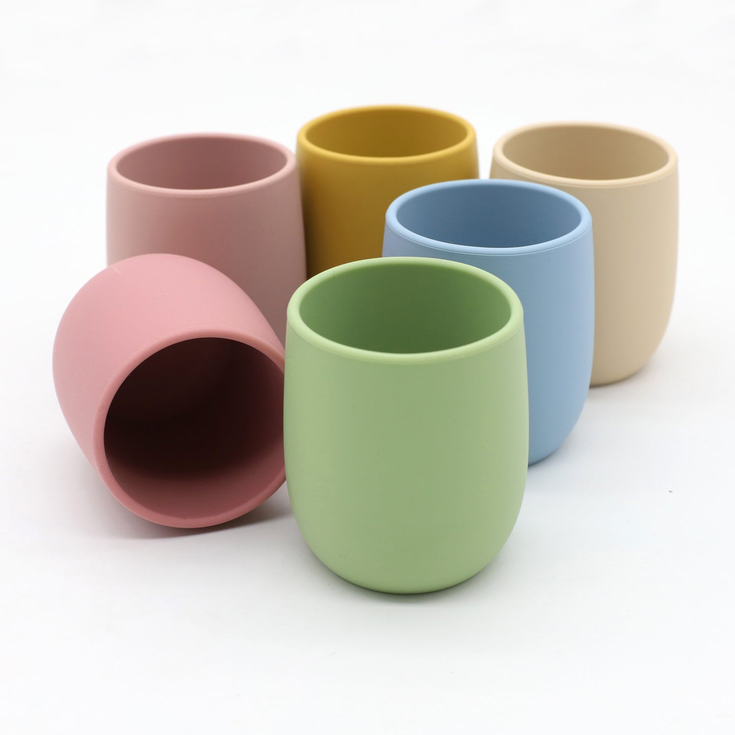 Mini baby silicone water cup, easy-to-grip training cup, safe soft silicone, BPA-free, toddler open sip design.