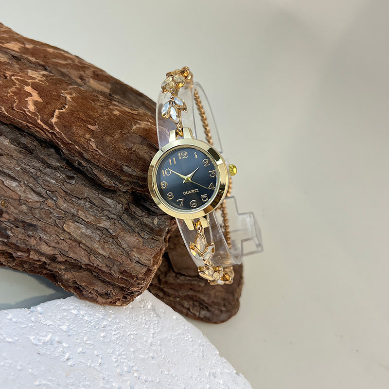 Elegant Ladies Quartz Watch, Round Alloy Case, Arabic Numeral Dial, Leaf-Shaped Diamond-Studded Bracelet